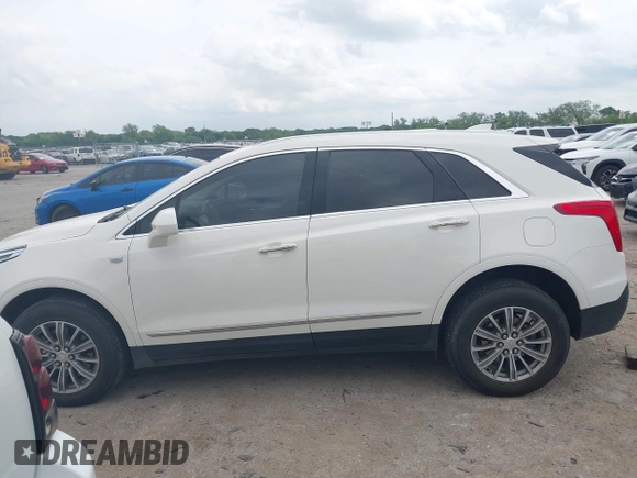 2019 Cadillac XT5 Luxury FWD z VIN 1GYKNCRSXKZ286643, wystawiony jako IAAI lot #42129213 z przebiegiem 87 091 mil mil oraz . Historia ofert i sprzedaży dostępna na DreamBid. Obrazek 14.