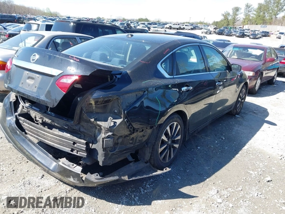 2018 Nissan Altima S with VIN 1N4AL3AP2JC187708, listed as a IAAI auction lot 41864283 with 158,527 mi miles and . Bid and sale history available at DreamBid. Image 4.