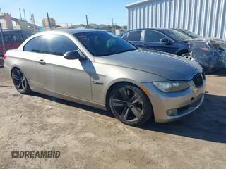 2007 BMW 3 Series 335i with VIN WBAWL73587PX49841, listed as a IAAI auction lot 41321892 with 173,556 mi miles. Bid and sale history available at carsss.com. Image 1.