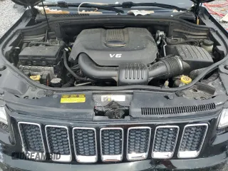 2015 Jeep Grand Cherokee Overland с VIN 1C4RJECG9FC620315, выставлен на аукционе Copart как лот 54569845 с пробегом 219 905 миль миль и Списание • Salvage title. История ставок и продаж доступна на DreamBid. Изображение 12.