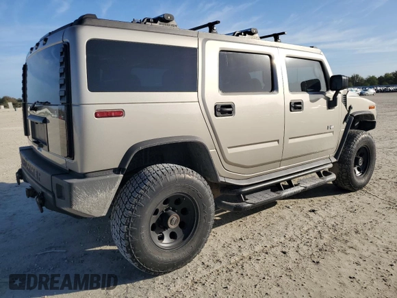 2003 Hummer H2 with VIN 5GRGN23U93H132284, listed as a Copart auction lot 78701904 with 153,171 mi miles and Non Repairable. Bid and sale history available at carsss.com. Image 3.