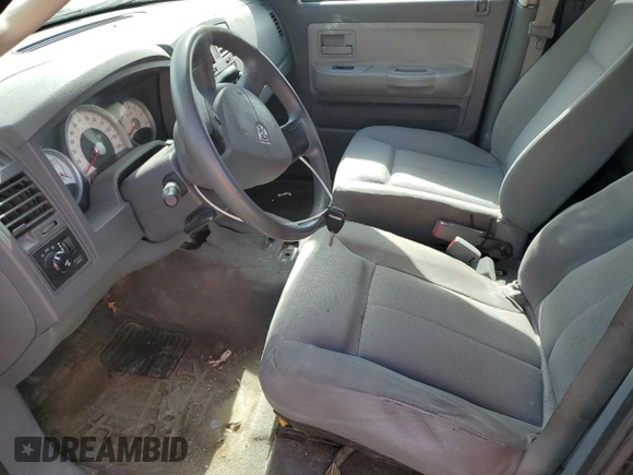 2006 Dodge Dakota SLT z VIN 1D7HW48N36S507891, wystawiony jako Copart lot #49534175 z przebiegiem 201 034 mil mil oraz Czysty tytuł • Clean title. Historia ofert i sprzedaży dostępna na DreamBid. Obrazek 7.