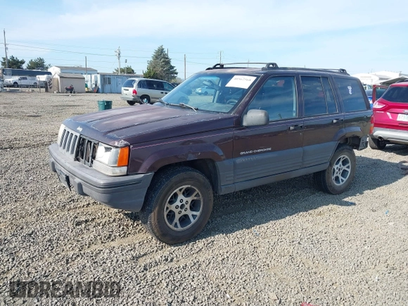 1996 Jeep Grand Cherokee Laredo with VIN 1J4GZ58S2TC262980, listed as a IAAI auction lot 41949514 with 269,674 mi miles and . Bid and sale history available at DreamBid. Image 2.