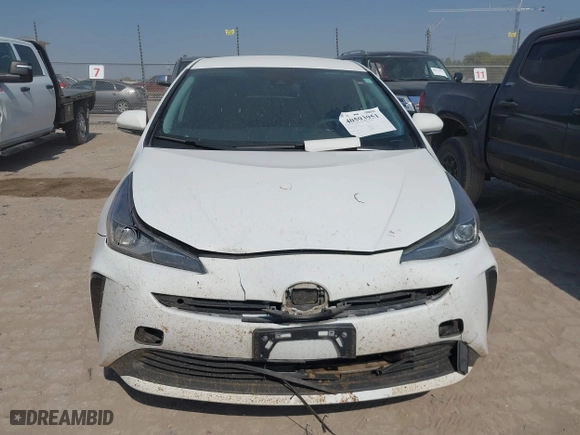 2021 Toyota Prius L Eco with VIN JTDKAMFU6M3141263, listed as a IAAI auction lot 40593951 with 95,921 mi miles. Bid and sale history available at carsss.com. Image 12.