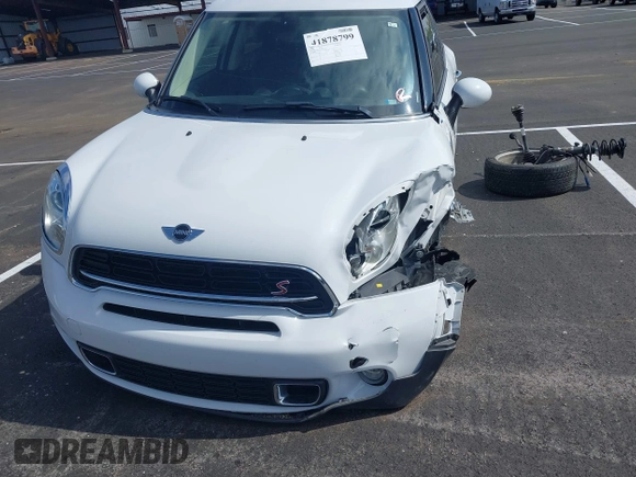 2016 MINI Countryman S with VIN WMWZC3C51GWT10458, listed as a IAAI auction lot 41878799 with 112,019 mi miles and . Bid and sale history available at DreamBid. Image 12.