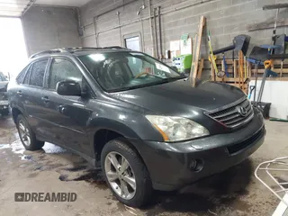 2007 Lexus RX 400h z VIN JTJGW31U172001122, wystawiony jako IAAI lot #42335831 z przebiegiem 232 699 mil mil oraz . Historia ofert i sprzedaży dostępna na DreamBid. Obrazek 1.