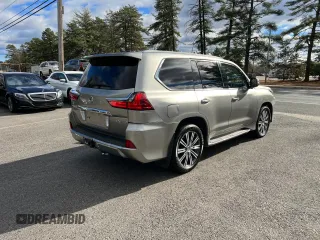 2016 Lexus LX 570 with VIN JTJHY7AX7G4203810, listed as a Copart auction lot 80800914 with 296,703 mi miles and Clean Title. Bid and sale history available at DreamBid. Image 4.