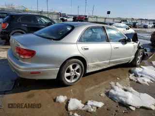 2002 Mazda Millenia z VIN JM1TA221921738582, wystawiony jako Copart lot #88500905 z przebiegiem 182 323 mil mil oraz Szkody całkowita. Historia ofert i sprzedaży dostępna na DreamBid. Obrazek 3.