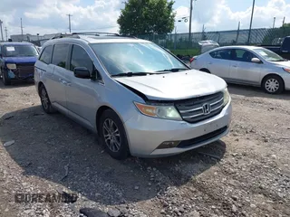2012 Honda Odyssey EX-L with VIN 5FNRL5H61CB081634, listed as a IAAI auction lot 42760909 with 197,949 mi miles and . Bid and sale history available at DreamBid. Image 1.