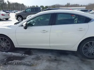 2016 Mazda 6 i Grand Touring с VIN JM1GJ1W55G1468475, выставлен на аукционе IAAI как лот 41651004 с пробегом 31 332 миль миль и . История ставок и продаж доступна на DreamBid. Изображение 14.