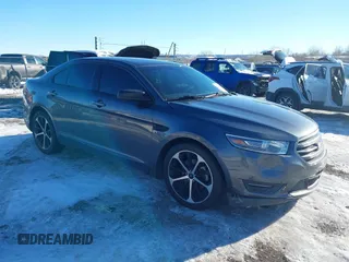 2015 Ford Taurus Limited with VIN 1FAHP2J85FG165823, listed as a IAAI auction lot 41315889 with 134,165 mi miles. Bid and sale history available at carsss.com. Image 1.