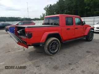 2021 Jeep Gladiator High Altitude z VIN 1C6HJTFG4ML579074, wystawiony jako Copart lot #57145415 z przebiegiem 52 145 mil mil oraz Szkoda całkowita • Salvage title. Historia ofert i sprzedaży dostępna na DreamBid. Obrazek 3.