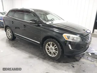 2015 Volvo XC60 T5 Drive-E Premier with VIN YV440MDB9F2622000, listed as a IAAI auction lot 41614656 with 130,868 mi miles. Bid and sale history available at carsss.com. Image 1.