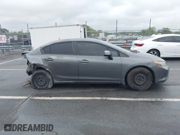 2012 Honda Civic LX with VIN 2HGFB2F58CH593658, listed as a IAAI auction lot 41965400 with 172,340 mi miles and . Bid and sale history available at DreamBid. Image 13.