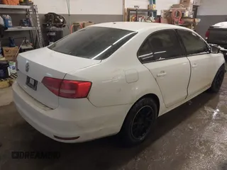 2015 Volkswagen Jetta S with VIN 3VW1K7AJ4FM280524, listed as a IAAI auction lot 41288382 with 136,582 mi miles and . Bid and sale history available at DreamBid. Image 4.