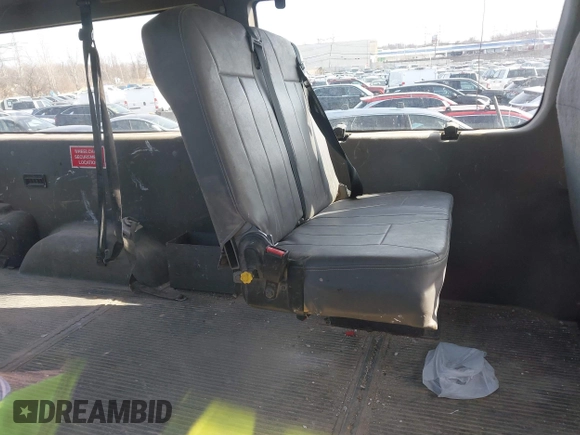 2008 Ford Econoline Cargo Commercial with VIN 1FTNE24L08DA50635, listed as a IAAI auction lot 41784919 with 90,975 mi miles and . Bid and sale history available at DreamBid. Image 8.