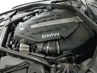 2012 BMW 7 Series 750Li xDrive with VIN WBAKC8C57CC435569, listed as a IAAI auction lot 41813222 with 139,751 mi miles and . Bid and sale history available at DreamBid. Image 12.