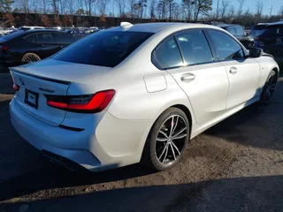 2020 BMW 3 Series M340i xDrive with VIN WBA5U9C00LFH73594, listed as a IAAI auction lot 41574837 with 46,702 mi miles and . Bid and sale history available at DreamBid. Image 4.