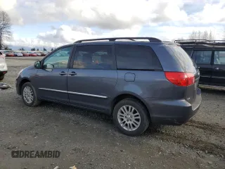2010 Toyota Sienna XLE with VIN 5TDDK4CC0AS032292, listed as a Copart auction lot 48085825 with 127,599 mi miles and Clean title. Bid and sale history available at DreamBid. Image 2.