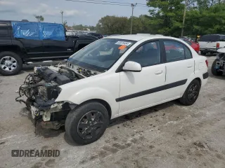 2009 Kia Rio LX with VIN KNADE223996526222, listed as a Copart auction lot 69976484 with 318,702 mi miles and Salvage Title. Bid and sale history available at DreamBid. Image 1.
