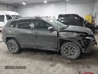 2021 Jeep Cherokee Trailhawk z VIN 1C4PJMBX4MD148597, wystawiony jako IAAI lot #41622099 z przebiegiem 48 452 mil mil oraz . Historia ofert i sprzedaży dostępna na DreamBid. Obrazek 13.