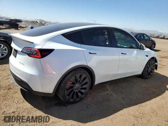 2024 Tesla Model Y Performance with VIN 7SAYGDEF6RA284171, listed as a Copart auction lot 50317205 with 6,870 mi miles and Salvage Title. Bid and sale history available at DreamBid. Image 3.