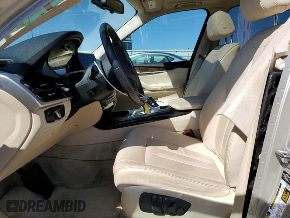 2014 BMW X5 xDrive35i with VIN 5UXKR0C55E0H23681, listed as a Copart auction lot 52183885 with 142,290 mi miles and Salvage Title. Bid and sale history available at carsss.com. Image 7.