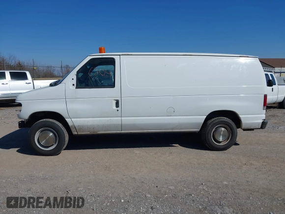 2003 Ford Econoline Cargo Commercial with VIN 1FTNE24L43HB35916, listed as a IAAI auction lot 41526304 with 86,810 mi miles and . Bid and sale history available at carsss.com. Image 14.