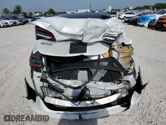 2020 Tesla Model 3 Standard Range Plus z VIN 5YJ3E1EA3LF632566, wystawiony jako Copart lot #56416625 z przebiegiem Nie podano mil oraz Nie do naprawy • Non repairable. Historia ofert i sprzedaży dostępna na DreamBid. Obrazek 6.
