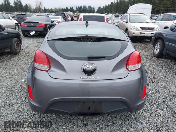 2012 Hyundai Veloster w/Gray Int z VIN KMHTC6AD7CU037130, wystawiony jako IAAI lot #41778588 z przebiegiem 125 549 mil mil oraz . Historia ofert i sprzedaży dostępna na DreamBid. Obrazek 16.