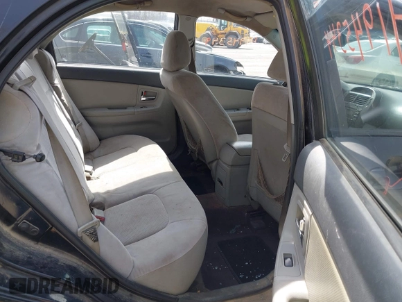 2009 Kia Spectra EX with VIN KNAFE221X95653719, listed as a IAAI auction lot 41945349 with 239,878 mi miles. Bid and sale history available at carsss.com. Image 8.