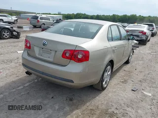 2006 Volkswagen Jetta Value Edition z VIN 3VWPF71K16M760303, wystawiony jako IAAI lot #42352139 z przebiegiem 112 012 mil mil oraz . Historia ofert i sprzedaży dostępna na DreamBid. Obrazek 4.