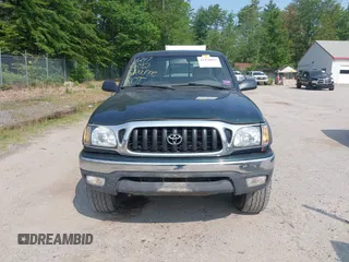 2002 Toyota Tacoma with VIN 5TEWM72NX2Z097369, listed as a IAAI auction lot 42476892 with 90,855 mi miles and . Bid and sale history available at DreamBid. Image 13.