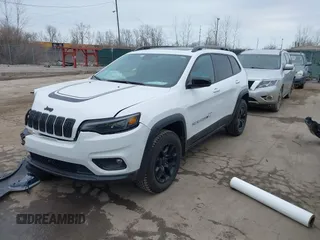 2022 Jeep Cherokee X with VIN 1C4PJMCX0ND537673, listed as a IAAI auction lot 41696191 with 22,063 mi miles. Bid and sale history available at carsss.com. Image 2.