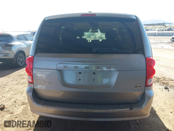 2015 Dodge Grand Caravan SXT with VIN 2C4RDGCG1FR649074, listed as a IAAI auction lot 41759409 with 116,856 mi miles and . Bid and sale history available at DreamBid. Image 17.