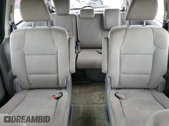 2014 Honda Odyssey LX z VIN 5FNRL5H21EB106600, wystawiony jako Copart lot #57875765 z przebiegiem 122 159 mil mil oraz Szkoda całkowita • Salvage title. Historia ofert i sprzedaży dostępna na DreamBid. Obrazek 10.