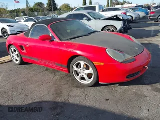 2002 Porsche Boxster z VIN WP0CA29852U622474, wystawiony jako IAAI lot #41264294 z przebiegiem 156 000 mil mil oraz . Historia ofert i sprzedaży dostępna na DreamBid. Obrazek 1.