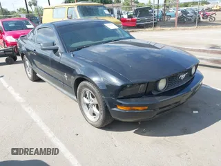 2007 Ford Mustang Deluxe with VIN 1ZVFT80N675254270, listed as a IAAI auction lot 42142385 with 182,962 mi miles. Bid and sale history available at carsss.com. Image 1.