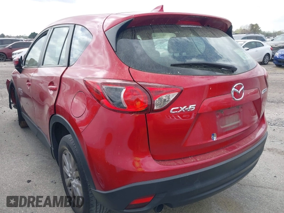 2016 Mazda CX-5 Sport with VIN JM3KE2BY9G0911535, listed as a IAAI auction lot 41906402 with 134,477 mi miles. Bid and sale history available at carsss.com. Image 3.