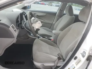 2010 Toyota Corolla with VIN 1NXBU4EE9AZ193022, listed as a Copart auction lot 61753695 with 208,597 mi miles and Salvage title. Bid and sale history available at DreamBid. Image 7.