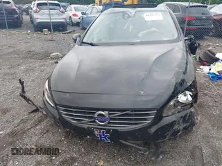 2016 Volvo S60 T5 Premier z VIN YV1612TK3G2411949, wystawiony jako IAAI lot #42353357 z przebiegiem 152 937 mil mil oraz . Historia ofert i sprzedaży dostępna na DreamBid. Obrazek 11.