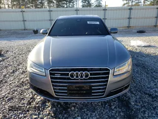 2015 Audi A8 z VIN WAUJGAFD9FN022023, wystawiony jako Copart lot #86048354 z przebiegiem Nie podano mil oraz Szkoda całkowita • Salvage title. Historia ofert i sprzedaży dostępna na DreamBid. Obrazek 5.