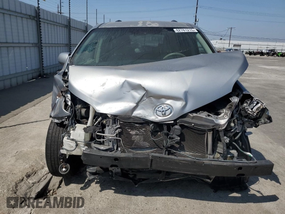 2012 Toyota Sienna LE AAS with VIN 5TDKK3DC2CS207404, listed as a Copart auction lot 62781215 with 200,757 mi miles and Salvage title. Bid and sale history available at DreamBid. Image 5.