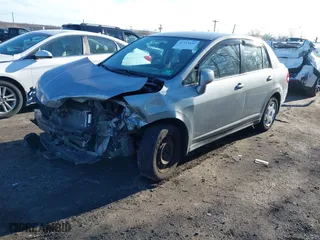 2007 Nissan Versa 1.8 S with VIN 3N1BC11EX7L404939, listed as a IAAI auction lot 41753426 with 163,944 mi miles. Bid and sale history available at carsss.com. Image 17.