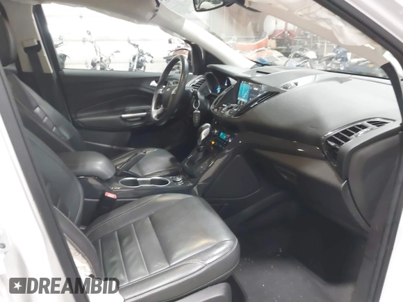 2016 Ford Escape Titanium with VIN 1FMCU9J95GUB02377, listed as a IAAI auction lot 41869557 with 88,441 mi miles. Bid and sale history available at carsss.com. Image 5.