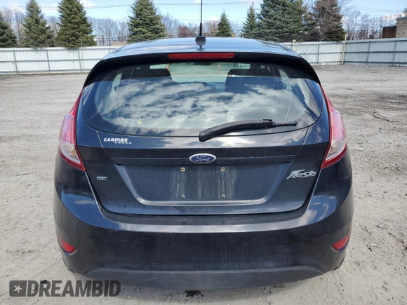 2014 Ford Fiesta SE z VIN 3FADP4EJ5EM182407, wystawiony jako Copart lot #51848425 z przebiegiem 134 347 mil mil oraz Szkoda całkowita • Salvage title. Historia ofert i sprzedaży dostępna na DreamBid. Obrazek 6.
