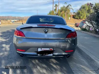 2011 BMW Z4 sDrive35i with VIN WBALM7C57BE383536, listed as a Copart auction lot 49841415 with 107,044 mi miles and Clean Title. Bid and sale history available at carsss.com. Image 6.