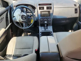 2015 Mazda CX-9 Sport с VIN JM3TB2BA5F0459548, выставлен на аукционе Copart как лот 60217845 с пробегом 152 486 миль миль и Чистый • Clean title. История ставок и продаж доступна на DreamBid. Изображение 8.