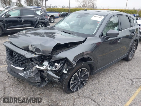 2022 Mazda CX-5 2.5 S Premium Plus Package with VIN JM3KFBEM1N0523105, listed as a IAAI auction lot 41730897 with 64,008 mi miles. Bid and sale history available at carsss.com. Image 18.