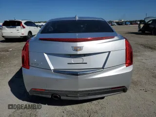 2015 Cadillac ATS Luxury RWD z VIN 1G6AB5RA6F0136166, wystawiony jako Copart lot #45767735 z przebiegiem Nie podano mil oraz Szkoda całkowita • Salvage title. Historia ofert i sprzedaży dostępna na DreamBid. Obrazek 6.